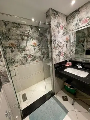 a bathroom with a shower and a sink at Apartment in El gouna mangrouovy in Hurghada