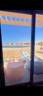 a view of an airport from a window at Villa ancient hill in Hurghada
