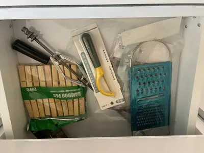 a box with various kitchen utensils and other items at Bayt Hassan S18 - Fabulous Roof top 1 bedroom apartment in Hurghada