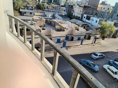arial view of a city with cars parked in a parking lot at Dream House in Hurghada