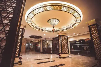 a large lobby with a large chandelier in a store at Salvatore Rooms All Inclusive -Cornich Street in Hurghada