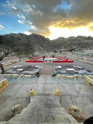 a group of benches and tables in a park at Turista Tour in Hurghada