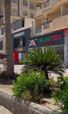 a street sign in front of a building at apartment for rent in hurghada in Hurghada