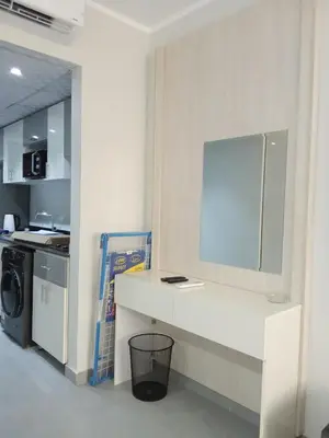 a kitchen with a white counter and a washing machine at Scandic Resort Hurghada in Hurghada