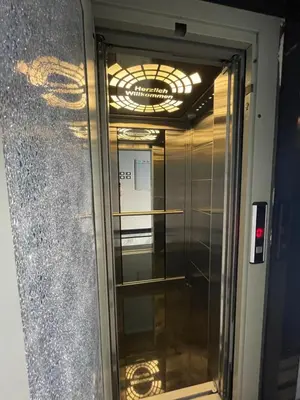 a glass door leading into a building with a ceiling at Endless Summer Apartment House W3 in Hurghada