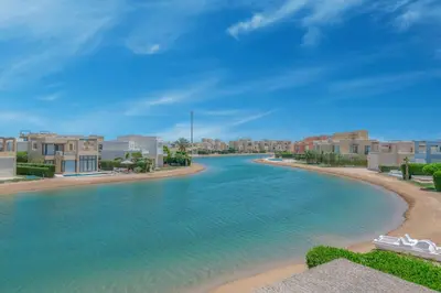 a view of a river in a city with buildings at The Lake View Villa 4BR at Tawila El Gouna in Hurghada