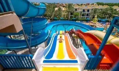 a ride in a water park with a slide at شاليه بقرية ميراج باي in Hurghada