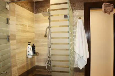 a bathroom with a shower with a towel at Touristic centre beach1 in Hurghada