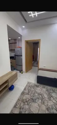 an empty room with a bed and a kitchen at ميراج باى الغردقه in Hurghada