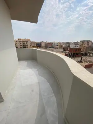 a balcony with a view of a city at Private apartment in Hurghada