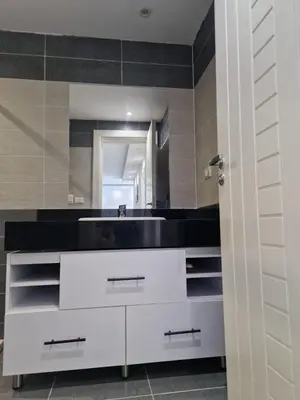 a bathroom with a sink and a mirror at Hurghada Fanader Bay Lever111 in Hurghada