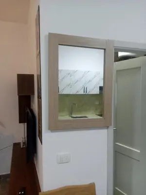 a window on a wall in a room at One bedroom apartment with living room in Aqua Infinity before El Gouna in Hurghada