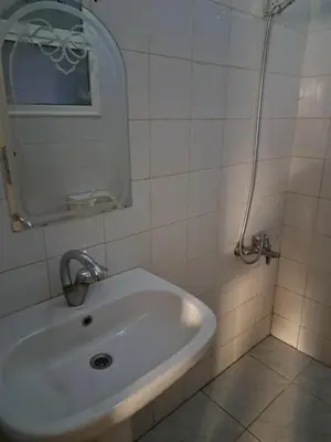 a bathroom with a sink and a mirror at Lotos studio in Hurghada