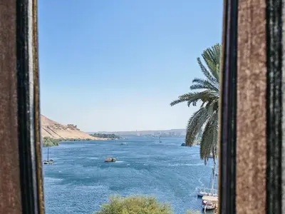 a view of a river from a window at Villa Swenet in Aswan
