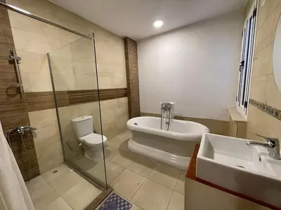 a bathroom with a shower and a toilet and a sink at Luxor in Al Karnak