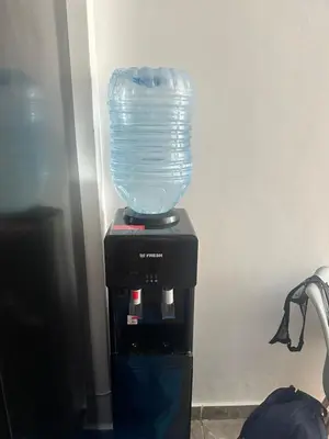a glass bowl sitting on top of a dispenser at Aqua Infinity in Hurghada