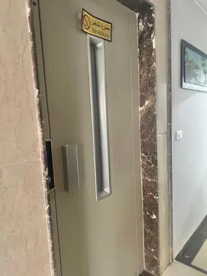 a door with a no smoking sign on it at Bostan in Hurghada