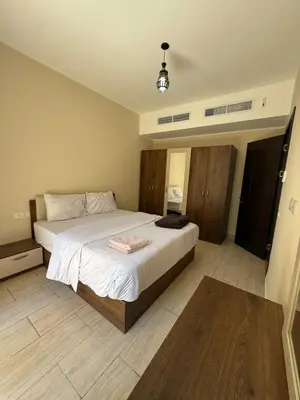 a bedroom with a large bed in a room at Casa bonita in Hurghada