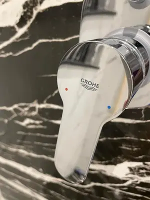 a close up of a shower head on a sink at Endless Summer Apartment House W7 in Safaga