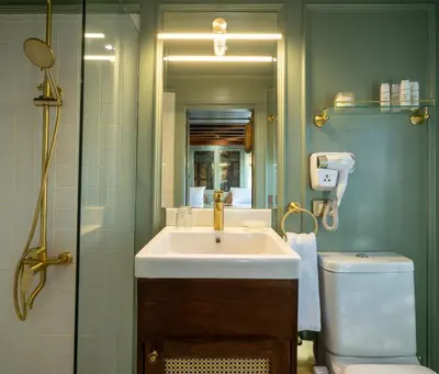a bathroom with a sink and a toilet at HMC Musk Dahabyia in Luxor