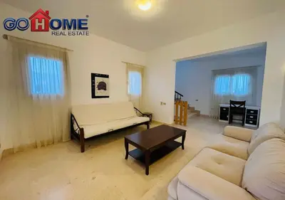 a living room with a couch and a table at Spacious Villa 4 Broom Private Pool V35 at White villa in Hurghada