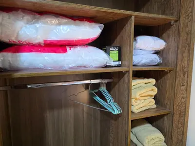 a cabinet filled with plastic bags and towels at Do wynajęcia apartament w Hurghadzie w resorcie Aqua Tropical in Hurghada