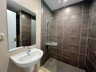a bathroom with a sink and a mirror at G-Cribs 1BR • Boho Pool Access in Hurghada