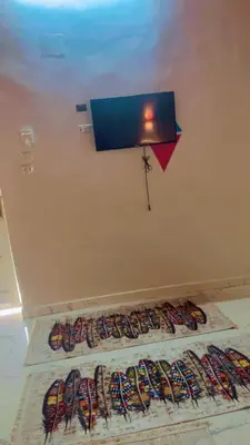 a room with a kite hanging on the wall at Wateen guest house in Aswan
