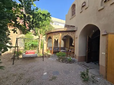 an entrance to a building with an iron gate at Villa Harmony Luxor in Luxor