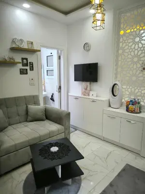 a living room with a couch and a coffee table at Hurghada Chill Out Home in Hurghada