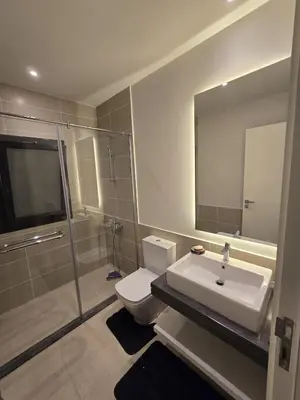 a bathroom with a toilet and a sink and a shower at Villa at Cyan Ring with infinity pool at lagoon in Hurghada