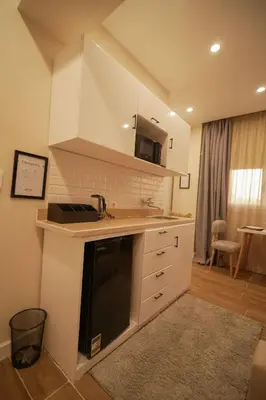 a kitchen with a sink and a counter top at nile view modern studio- 7 min from aswan station in Aswan