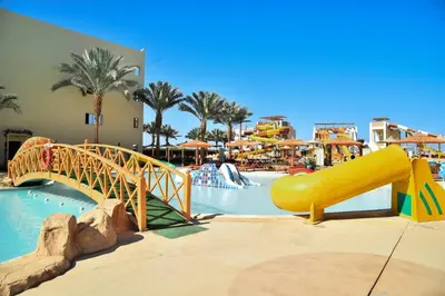 a water park with a slide and a water park at Al karma aqua beach in Hurghada