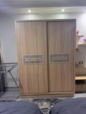 a wooden door with two windows in a room at Scandic Resort A531 in Hurghada