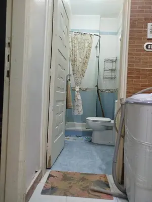 an open door to a bathroom with a toilet at flat in Hurghada Sheraton Metro street in Hurghada