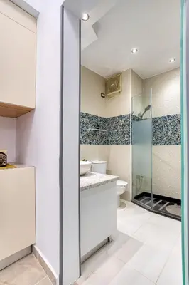 a bathroom with a shower and a toilet at Palm Beach Piazza Sahl Hasheesh One bedroom apartment A 401 by Peaks in Sahl Hasheesh