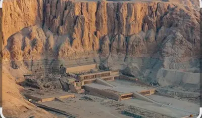 an ancient amphitheater in a rocky mountain at Elbess For Tourism in Jazīrat al ‘Awwāmīyah