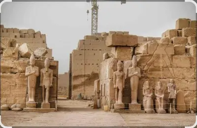 a group of statues standing in front of a building at Elbess For Tourism in Al Karnak