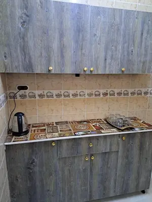 a kitchen counter with a tea kettle on it at Sweet Home 7 in Hurghada