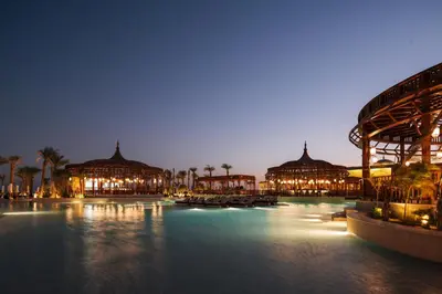 a view of a resort with buildings and a body of water at Al Kasr Sahl Hasheesh - Ultra All-Inclusive in Hurghada