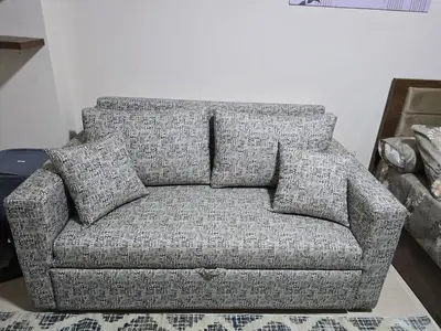a couch sitting in a living room at Golden Tiba in Hurghada