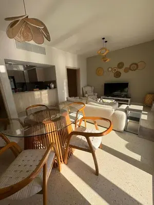 a living room with chairs and a table and a couch at Fanadir Marina 3bedroom private pool in Hurghada