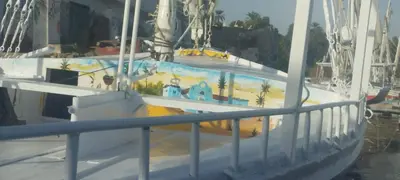 a boat with a painting on the side of it at دندرة بوت in Aswān