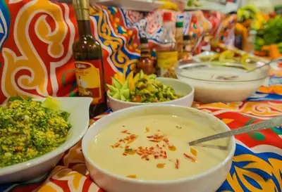 a table topped with bowls of soup and vegetables at Nile cruise from Luxor to Aswan 4 nights From Aswan to Luxor 3 nights in Luxor