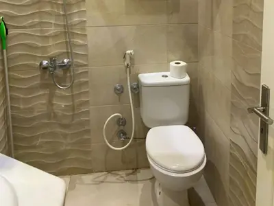 a bathroom with a toilet and a shower at One-Bedroom Chalet at Turtles Beach Resort , Pool & Side Sea View C22 in Hurghada