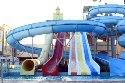 a water slide in a water park at Mirage Bay Resort Aquapark Ghada Suite in Hurghada