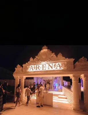 a group of people standing in front of an entrance at 2bedroom in selena bay resort in Hurghada