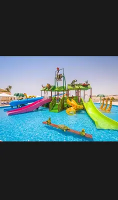 a water park with a bunch of slides in the water at Timeshare for rent at sunny days family resort in Hurghada