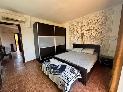 a bedroom with a bed in a room at Stella Makadi Bay - Balcony Apartment near Pool & Beach - Holiday Makadi in Hurghada