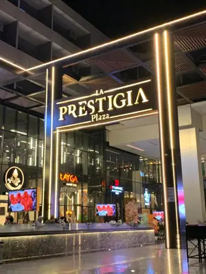 aprespiraci pizza sign in front of a building at Hurghada concierge at La Prestigia B2 4 in Hurghada